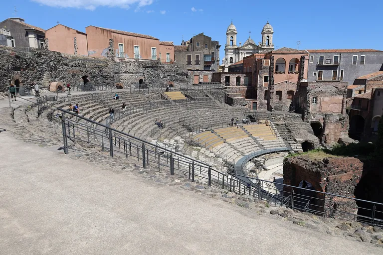 The exposed semicircular seating of Catania's Greco-Roman Theatre.