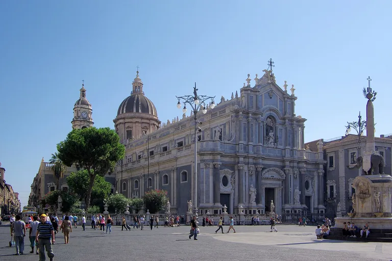 The Baroque facade and dome of Catania Cathedral.