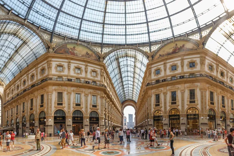 The glass-vaulted central arcade inside Milan's Galleria Vittorio Emanuele II.