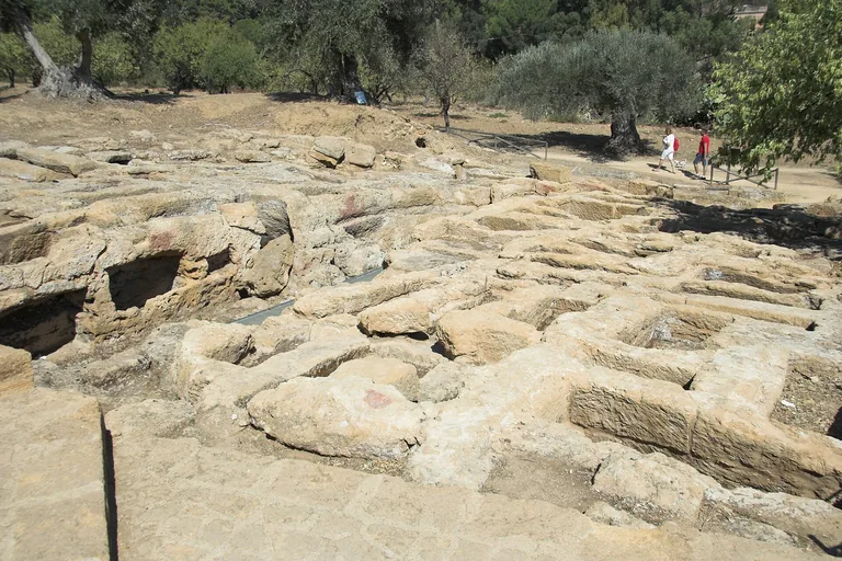 Rock-cut graves in Agrigento's early Christian necropolis.