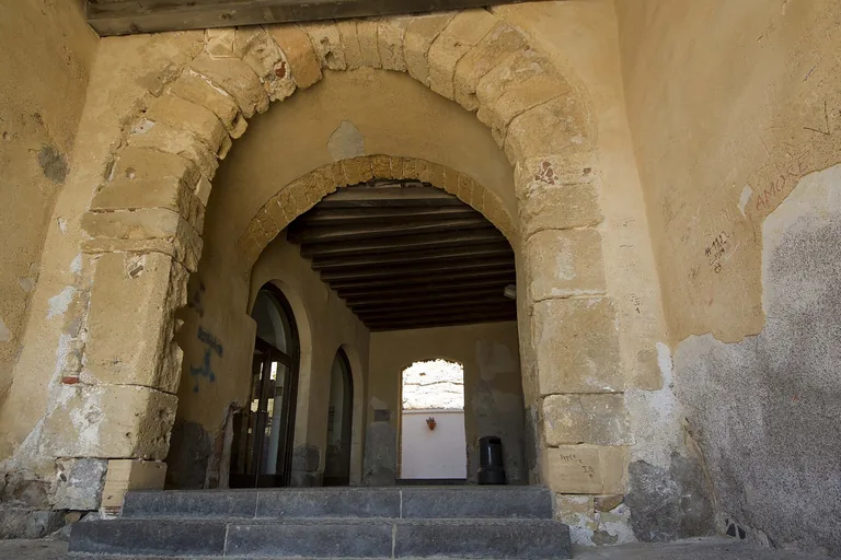 The rounded stone passage of Porta Pescara in Cefalu.