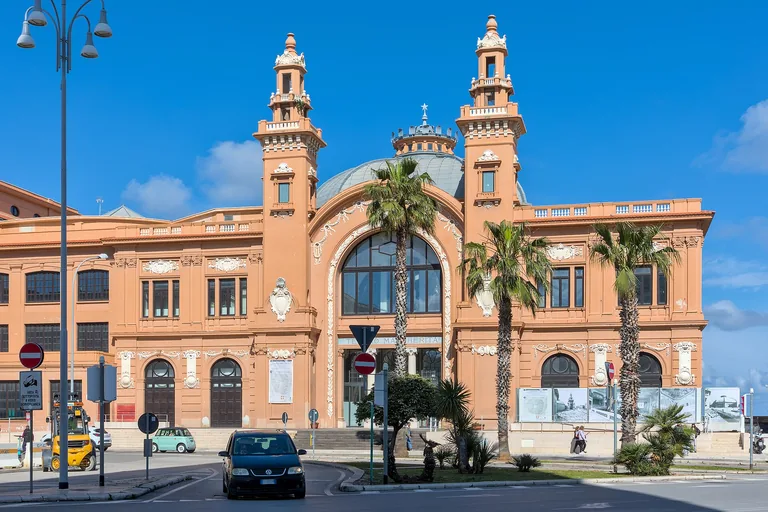 The pink Art Nouveau facade of Bari's Margherita Theatre.
