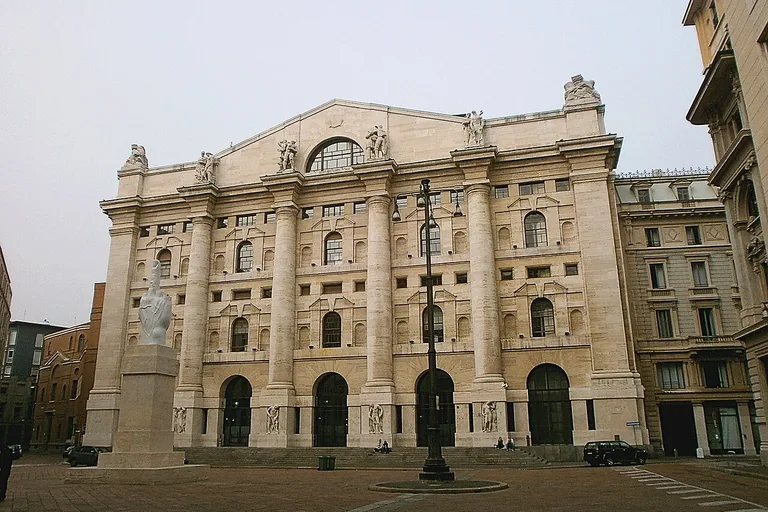 Palazzo Mezzanotte's facade and the L.O.V.E. sculpture in Milan's Piazza Affari.