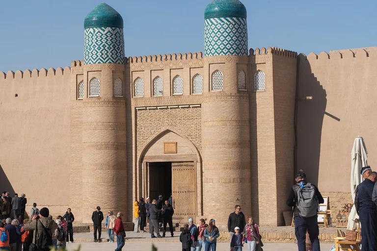 The east portal of the Kunya-Ark — the citadel's only entrance, flanked by tiled towers