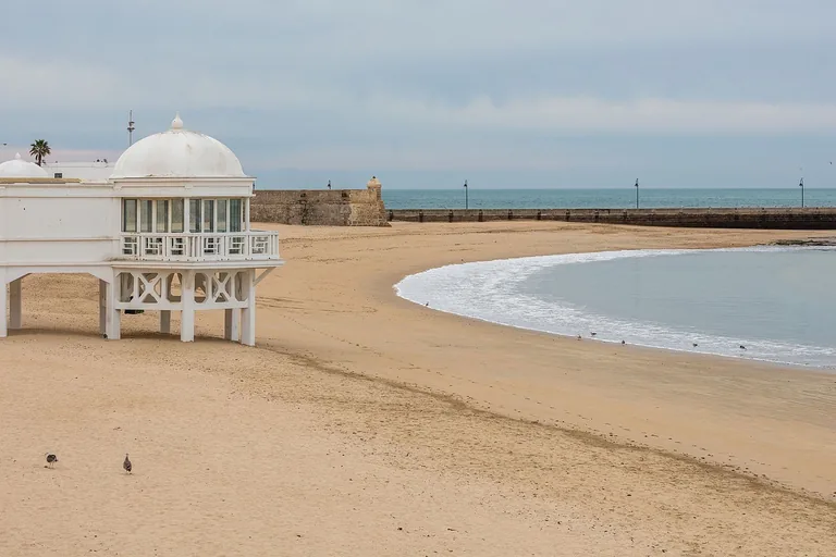 La Caleta beach, the spa pavilion and the Atlantic edge