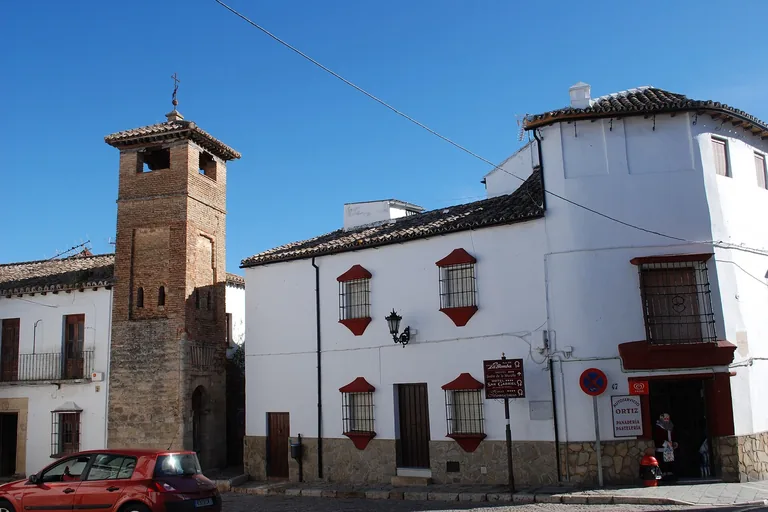 The minaret: two Muslim storeys under a Christian belfry