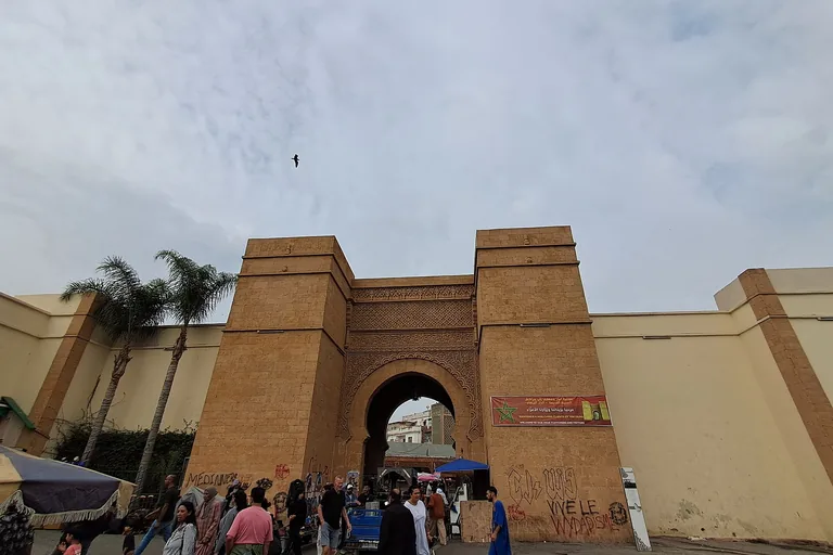Bab Marrakech's stone gateway opening into Casablanca's old medina.