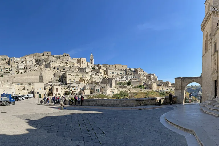 Piazza San Pietro Caveoso facing the Gravina and cave landscape.