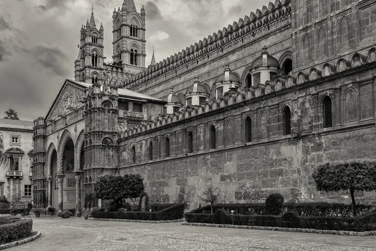 The cathedral from the south, with the Gothic-Catalan portico that carries the reused column