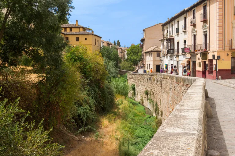 The Carrera del Darro along the river parapet