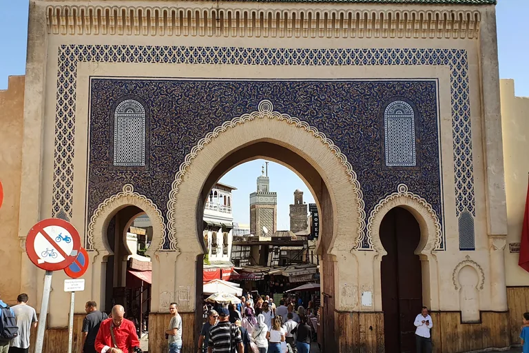 The blue-tiled outer face of Bab Bou Jeloud