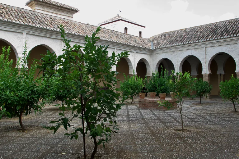 The surviving mosque courtyard (sahn) with its horseshoe arcades