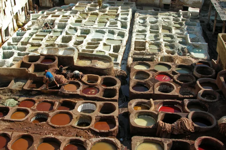 Pits and workers inside the Chouara tanning complex