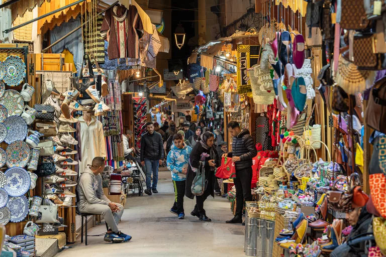 Shops and foot traffic along Tala'a Kebira