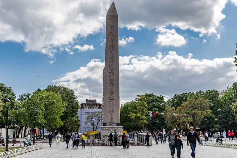 The Egyptian obelisk on the line of the buried spina, with its carved Roman base in the hollow below
