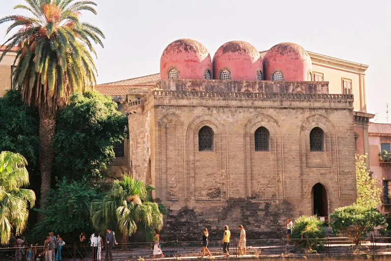 The three red domes of San Cataldo on Piazza Bellini, with the Martorana's campanile behind