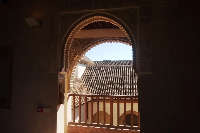 Stucco-framed arch of the upper-floor mirador room