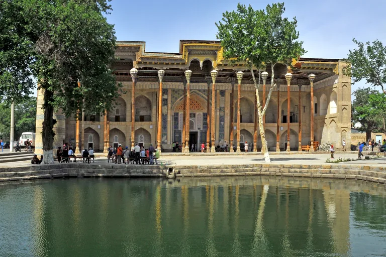 Bolo Hauz Mosque and its columned aiwan reflected in the hauz